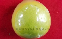 湖南本土柚子包装机成功交付使用，一款省成本节约人工的柚子热收缩膜包装机
